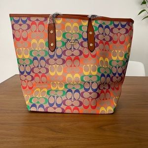 Rainbow coach bag.